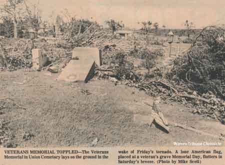 The Veteran's Memorial in Union Cemetery lays on the ground in the wake of the May 31, 1985 tornado.
