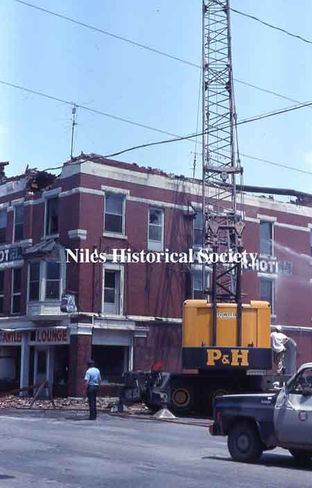 Photographs showing the demolition of the Allison Building in 1976 during urban renewal.