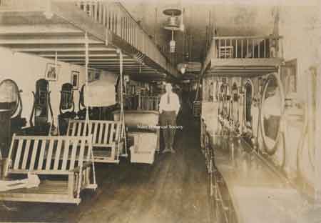 Interior view of the C.R. Holeton and Sons Furniture Store showing the many different styles of furniture that was available.