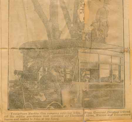 Youngstown Machine Gun Company entering Niles. When Governor Donaheynordered out the militia, guardsmen took command of Cleveland, Akron, Warren and Youngstown busses and rushed to Niles at top speed.