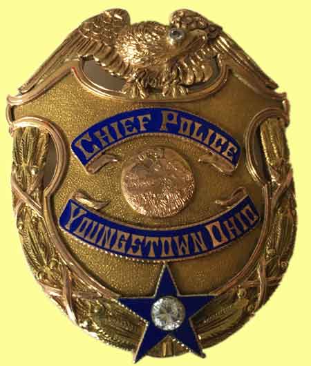 Badge presented to Chief Keogan Powell of Youngstown, Ohio in recognition of his excellent services as the head of the local police department. May 6, 1924.