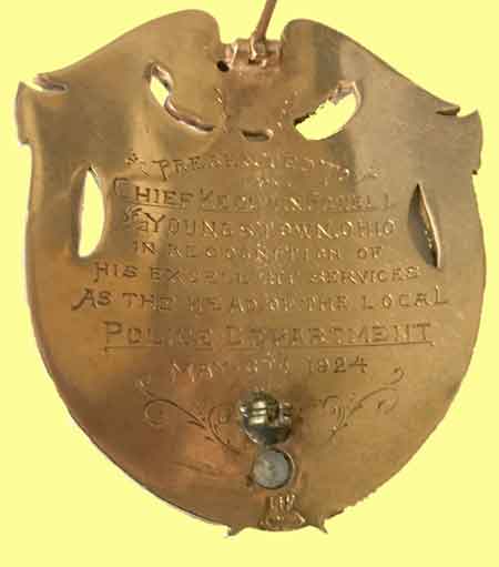 Badge presented to Chief Keogan Powell of Youngstown, Ohio in recognition of his excellent services as the head of the local police department. May 6, 1924.