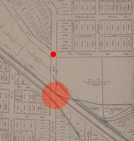 In 1924 there was no underpass but rather an incline and crossing gates that marked a strategic position for the Irish and Italian defenders on North Main Street.