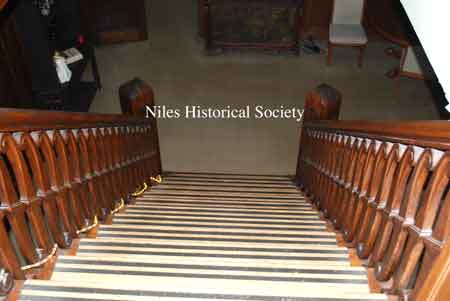 View of grand stairway from landing.