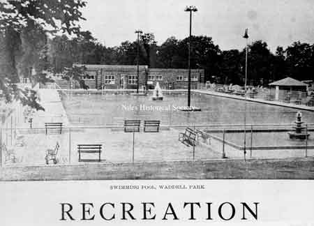 View of the pool area showing the diving boards, fountains and wading pool.