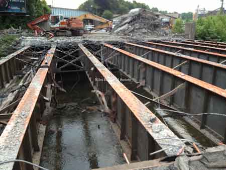 Demolition in 2013 of the 1953 bridge that carries Robbins Avenue traffic across the Mosquito Creek.