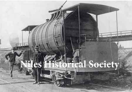 Water car- most roads were dirt and this car was used to water down roadway along streetcar tracks to fulfill safety regulations in effect in the 1890's and 1900's and to keep down dust since during dry weather any traffic caused clouds of dust.