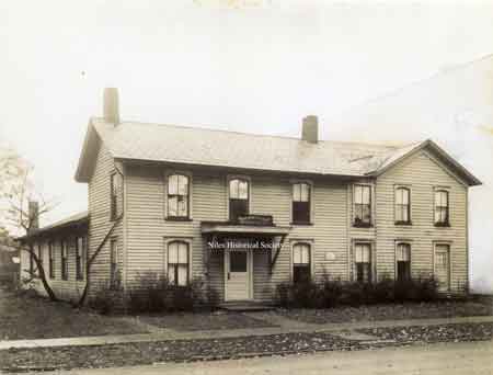 A photo of the Parish House of First Christian Church which was purchased in 1918 and razed in 1966.