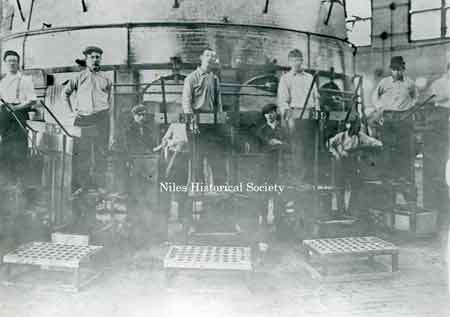 Glass blowers at the Fostoria Glass Works.