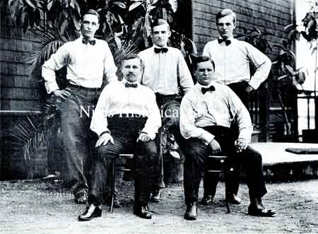 In their younger days these members of the Stevens family posed for the photographer. Standing, left to right, were: William H. Stevens Sr., Joseph B. Stevens, Sr. and Frank M. Stevens. Seated, left to right, were: Harry M. Stevens and Harold A. Stevens.