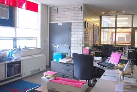 Secretary's desk and wall safe.