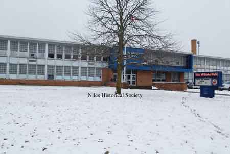 Panorama view of front of high school.