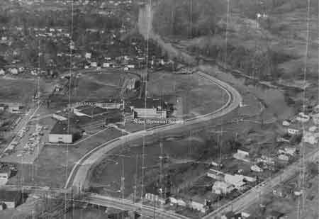 Aerial view of Niles McKinley High School before any additions were made to the building or grounds. ca 1958.