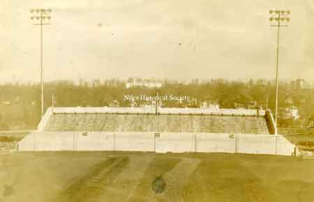 1943 view of the visitor's side of the original football stadium. In the distance stands Washington Elementary School.