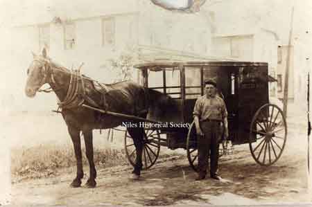 H.C. Mines and the Brown-Fordyce Dairy wagon.