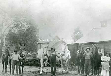 1916 - A. DeJute & Sons. L to R: Steve Ratchie, Bill Bridgens, Frank DeJute and Angeline DeJute.