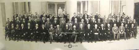 A formal portrait of the members of the Niles Kiwanis Club posed in front of the McKinley Memorial on Grand Army of the Republic Day, May 28, 1924.