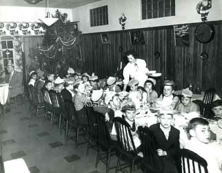 A Christmas party for the campers from the "Fresh Air" camp sponsored by the Niles Kiwanis Club in 1954.