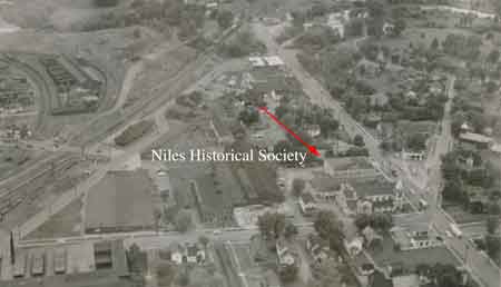 Aerial view of Robbins Avenue and Erie Street featuring Mount Carmel Church, Mission House, school and convent.
