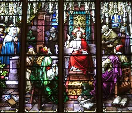 Mt. Carmel Church windows are adorned with stain glass artwork that the families donated.