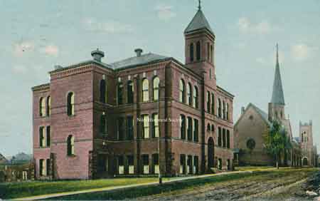 Another postcard view of the school and church looking north along Arlington Avenue.