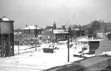 Photograph taken from the viaduct looking to the west. Seen are St. Stephen Church and the Nun's home, and St. Stephen school.