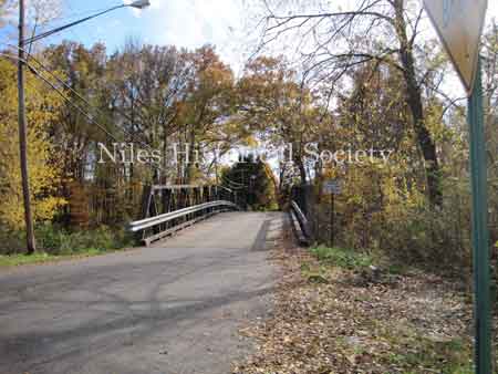 The Iron Bridge with its wooden roadway provided access to Salt-Spring Road from the end of Fifth Avenue