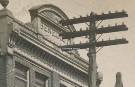 Close-up of the Benedict Building fa&ccedil;ade showing the date in which it was built.