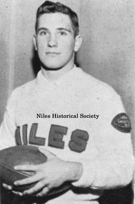 Senior Bo rein wearing the Niles McKinley football letter sweater with the 1961 State Champion medallion on his sleeve.