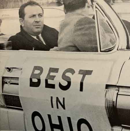Coach Tony Mason riding in Victory Parade for 1961 State Football Champions.