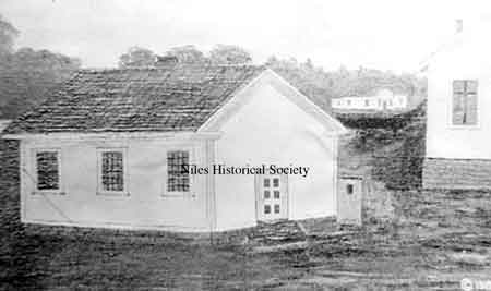 The little white school house is the only school shown on the map of 1844 and was located on the northeast corner behind the old Presbyterian Church where the McKinley Memorial now stands.