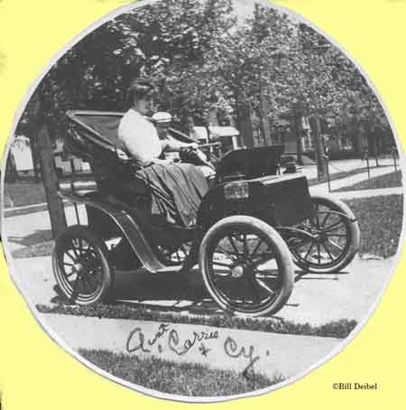 Cy with his Aunt Carrie in herelectric car,