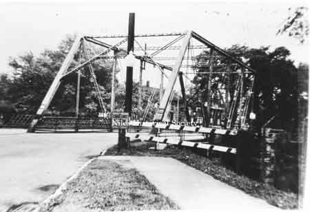 A 1950 newspaper photograph of the antiquated steel Federal Street Bridge across Mosquito Creek which has been replaced by a new concrete span.