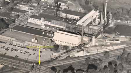 Aerial view of General Electric Plant and the North Main Street Erie railroad crossing.