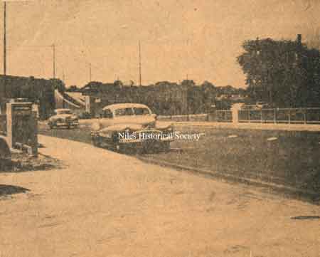 New Robbins Avenue bridge over Mosquito Creek with Herb Stein dealership.