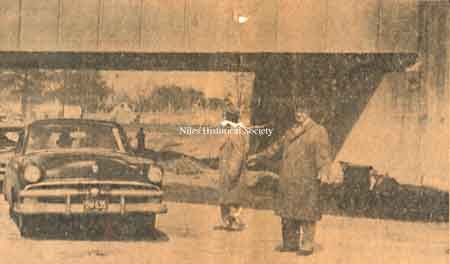 Mayor Edward P. Lenney welcomes the first car through the Main Street underpass.