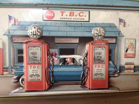 Lithographed metal sign of service station.