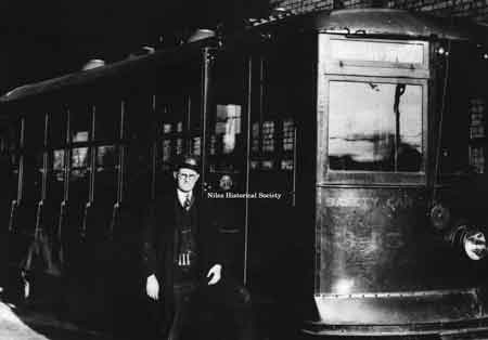 Picture of William Weber in the Niles car barn about the turn of the century. Picture of Utility Car # 345.