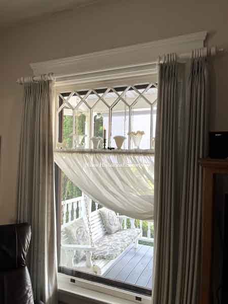 Living room window view of front porch.