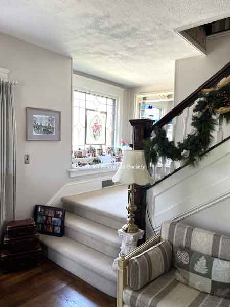 Stairway landing in living room area.