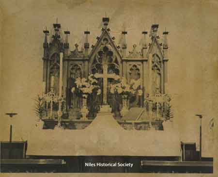 Photograph of original altar with crucifix.