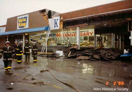 View of fire damage to sign of