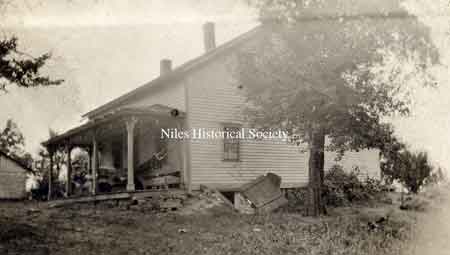 A photograph of the Ohl Homestead. It was built by Michael Ohl and used as an inn before being destroyed by the Meander Dam construction.