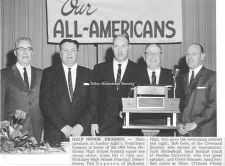 Speakers at Frontliners banquet in honor of the 1964 Niles McKinley High School football squad.