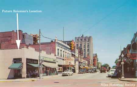 In 1954 the Style Shop and a grocery store occupied the future site of Reisman’s.