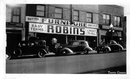 This is a photo of the Robins Furniture Company which was located at 33-35 East Park Avenue. The firm opened this store in June or July of 1937.