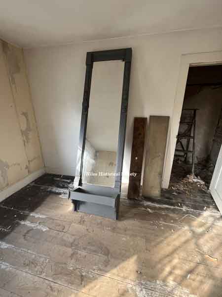 Second floor bedroom with long mirror