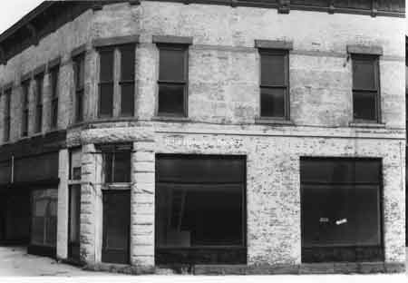 Photo taken of the north side of East State Street with Jensen’s Hardware on the west or inside of bend on State Street.