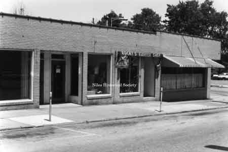 Picture taken of Rocky’s Barbershop located at 50 East Park Avenue in downtown Niles before urban renewal.