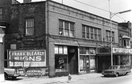 Photo taken of Frank Bleakley's Sign Company in the basement of the old Warner Theatre Building on State Street.